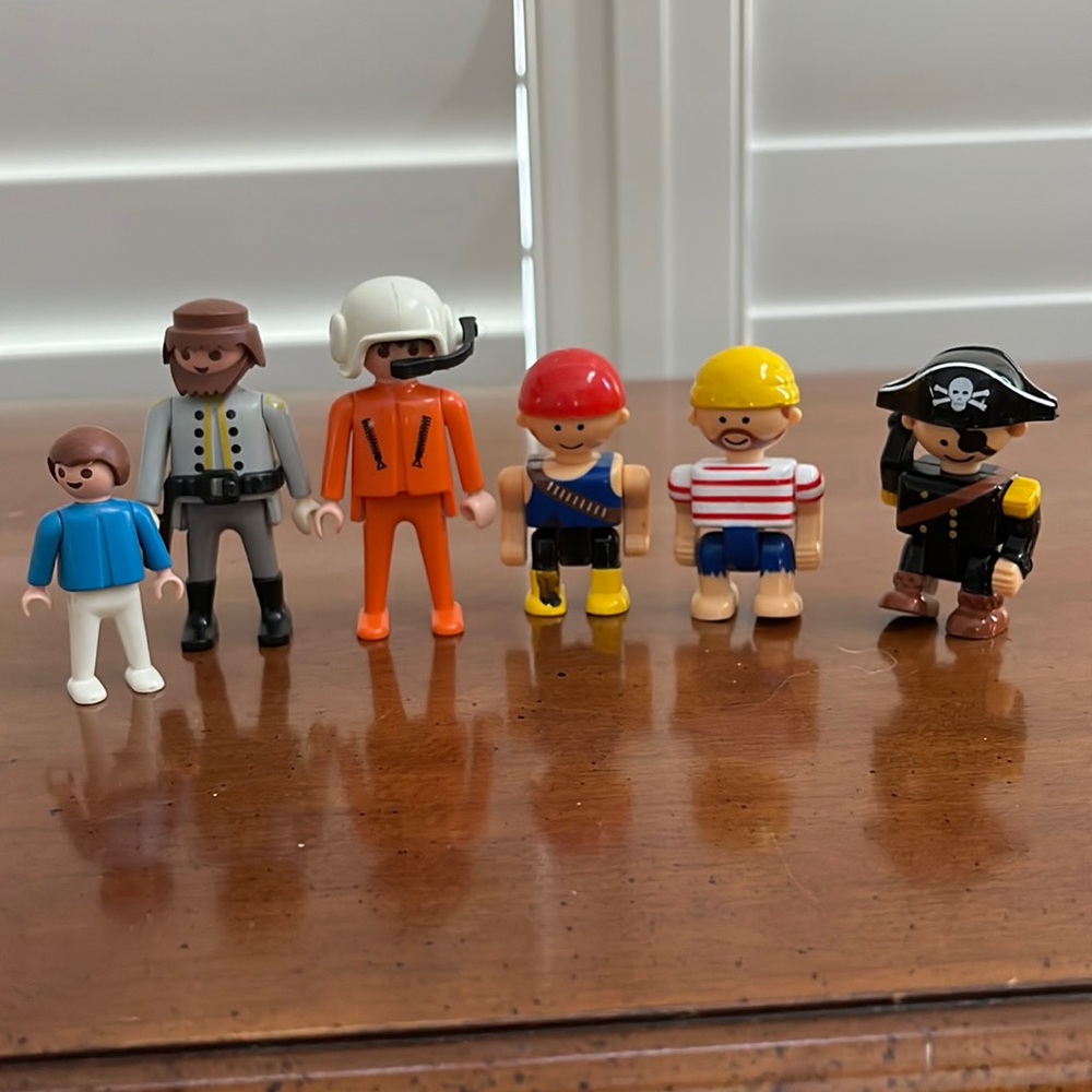 Playmobil Toy Figures . 3 pirates, 1 soldier, 1 construction worker, 1 child.